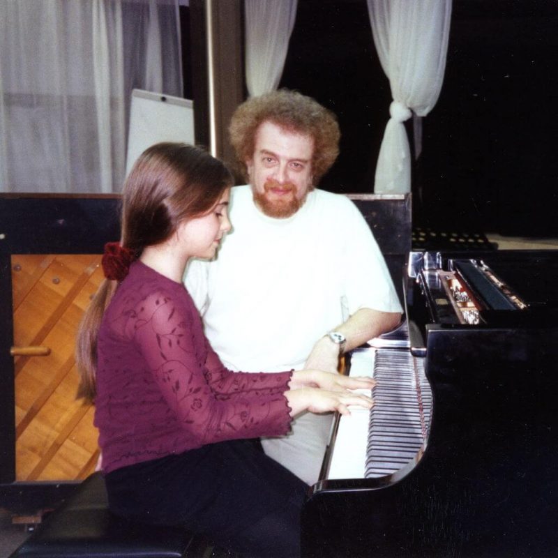 Alex Sokol with a piano student